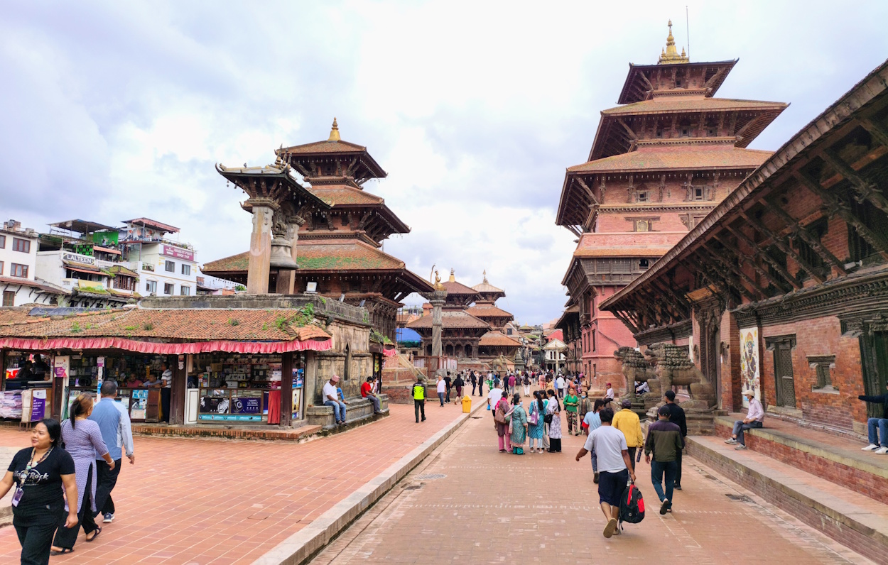 Visitors exploring Patan Durbar Square during a small-group walking tour in Kathmandu, Nepal